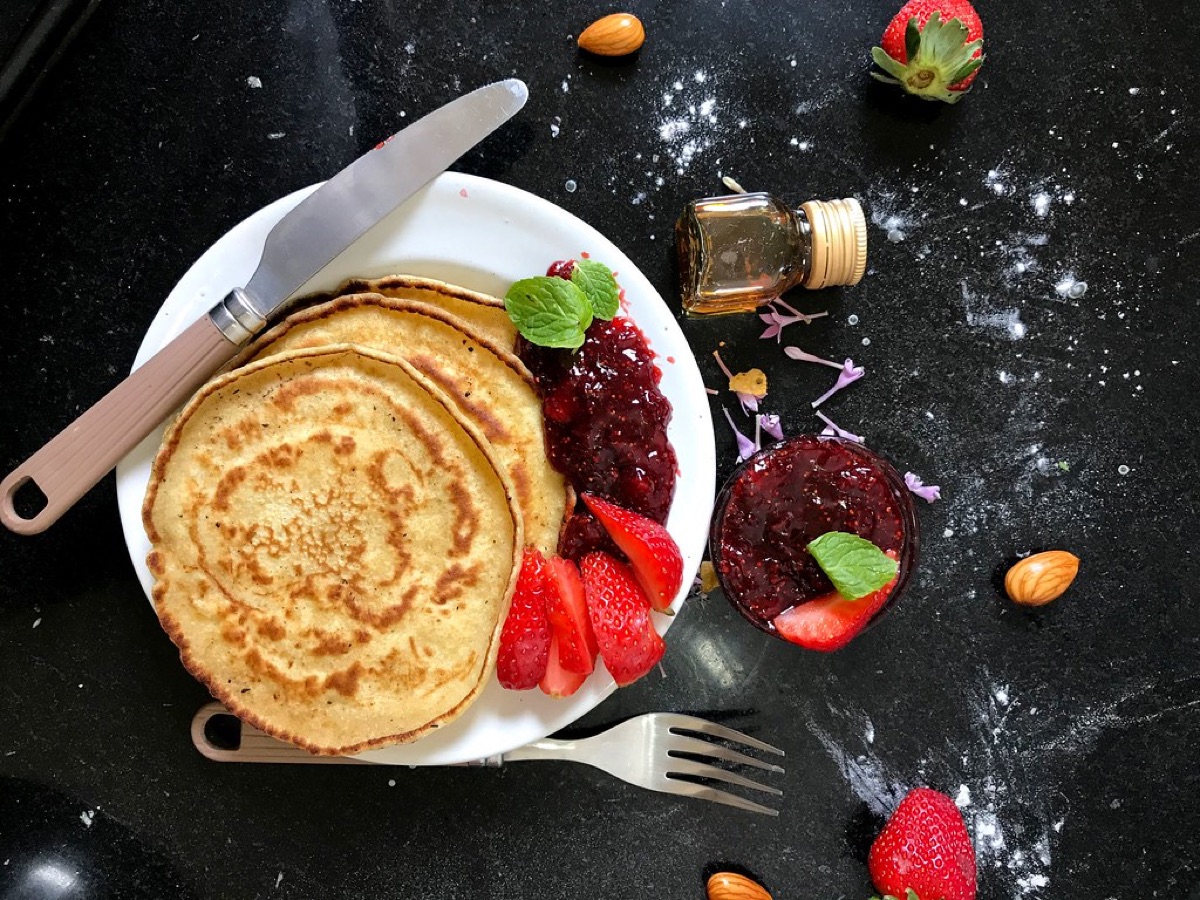 Fresh fruit and nuts on a plate for energy boost